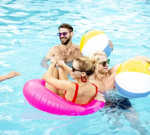 UC Residents hanging out in the community pool